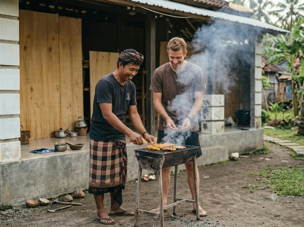 Grilling food outside a house in Indonesia